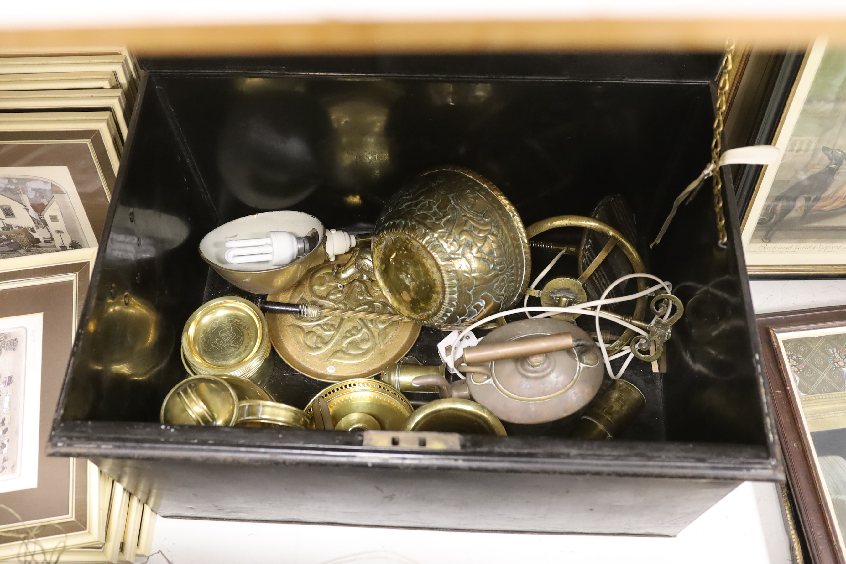 A collection of mixed copper and brass ware including an arts and crafts copper tray